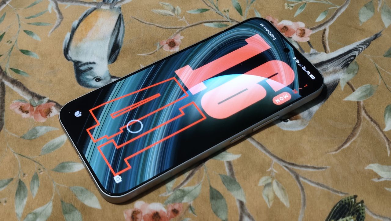 A Poco F8 Ultra on a flower-decorated pillow