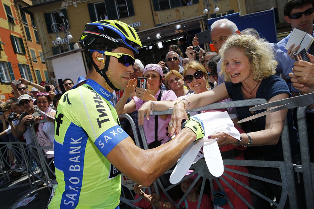 Alberto Contador (Tinkoff-Saxo) signs autographs at the start of stage 4 at the Giro d'Italia