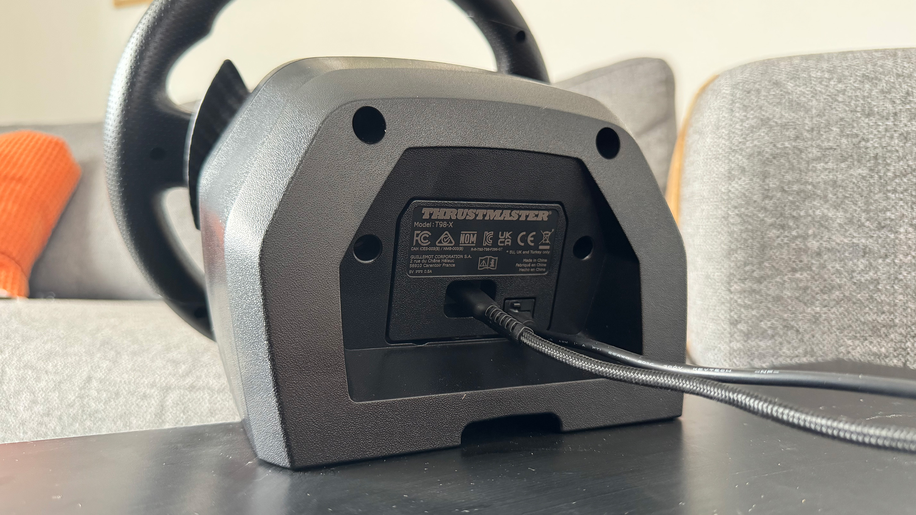 The Thrustmaster T248R in use.