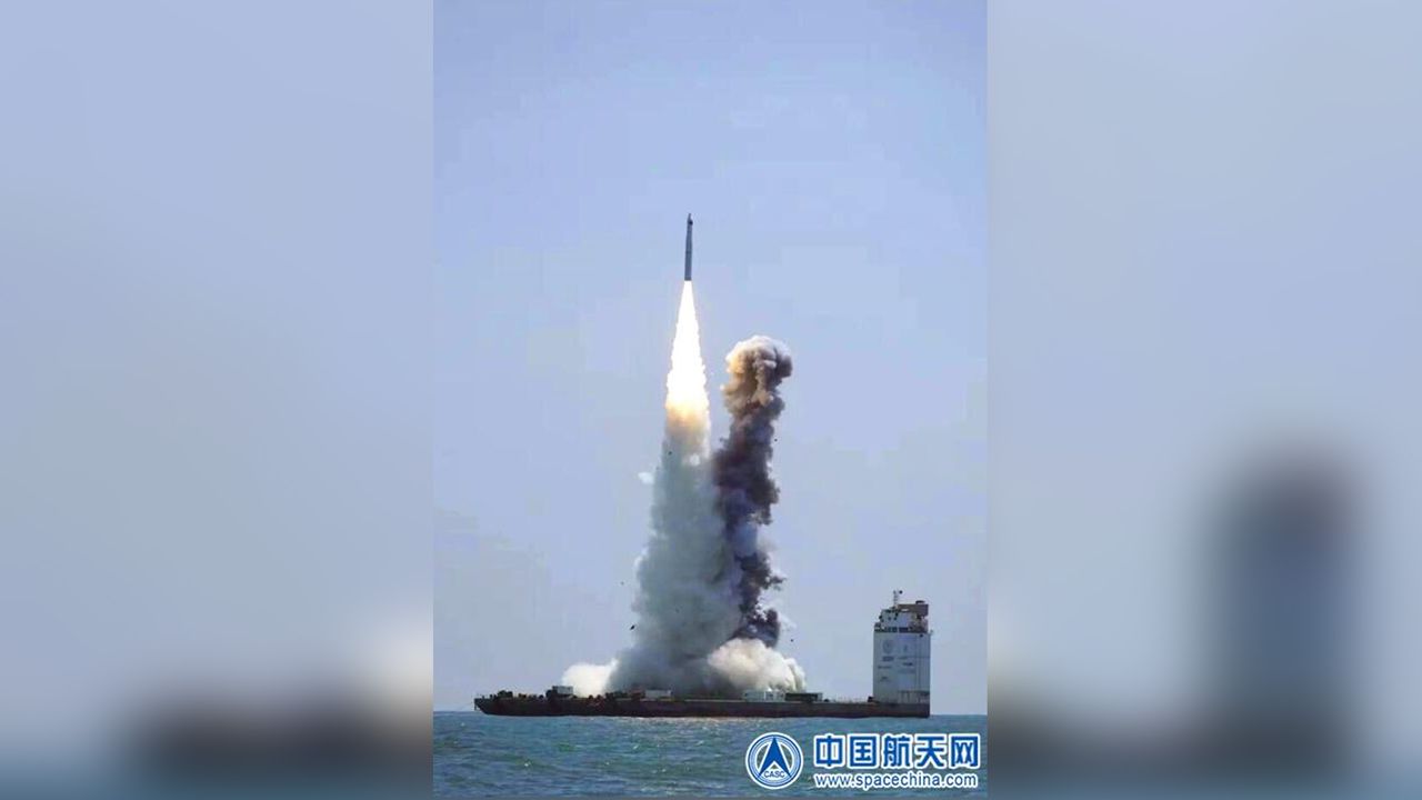 A Chinese Long March 11 rocket launches five small satellites into orbit from an ocean platform in the East China Sea on April 29, 2022.