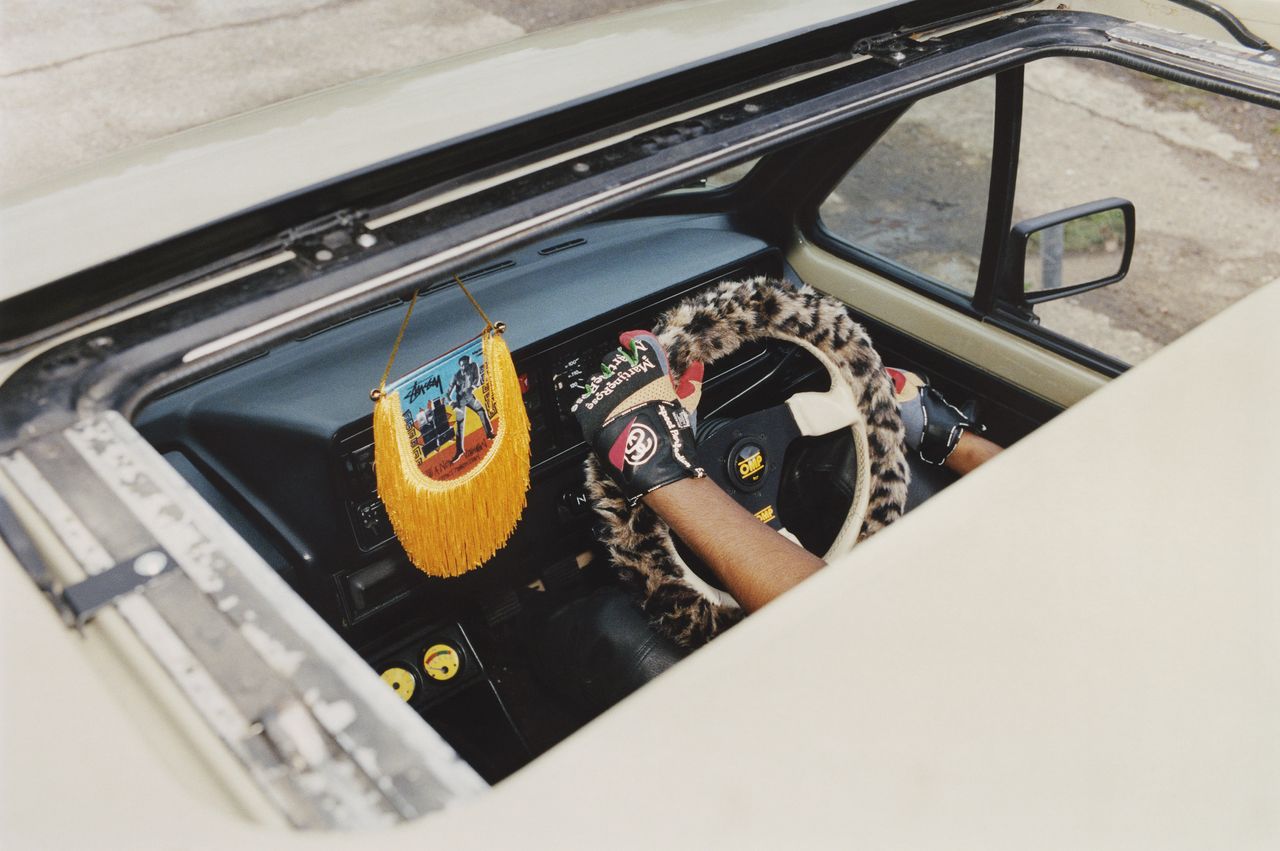 A car with colourful Martine Rose and Stussy accessories