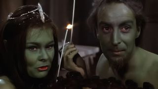 Dame Judi Dench and Ian Holm in green facepaint as fairies in A Midsummer's Night Dream