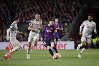 Lionel Messi scored twice in Barcelona's 3-0 win against Liverpool