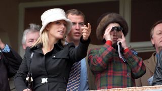 Zara Tindall, Peter Phillips and Princess Anne watch the horse races