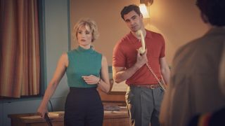 Gemma Arterton in a green top as Barbara and Tom Bateman in a red shirt and holding a phone as Clive in Funny Woman