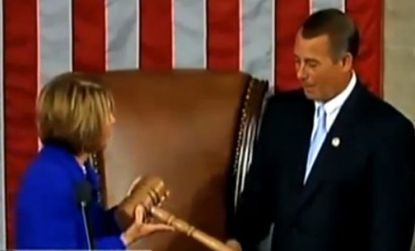 Nancy Pelosi passes on the "larger-than-most" gavel to Speaker of the House John Boehner. 