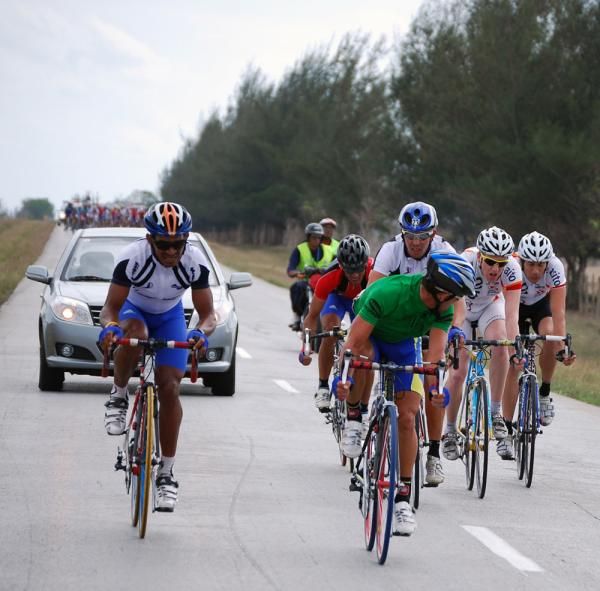 Riders check their margin over the peloton as the day's breakaway riders make their move.