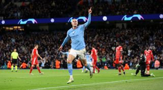 Erling Haaland of Manchester City celebrates after scoring his team's third goal during the UEFA Champions League quarter-final first leg match between Manchester City and Bayern Munich at the Etihad Stadium on April 10, 2023 in Manchester, United Kingdom.