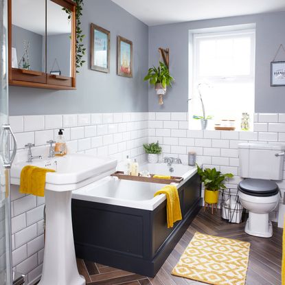 bathroom make over with scandi touches grey wall and parquet flooring