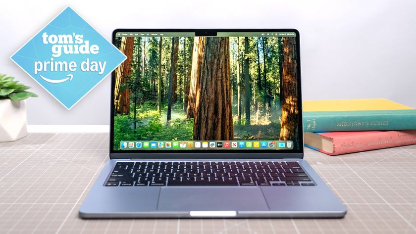 MacBook Air M4 on table with Tom&#039;s Guide Prime Day badge