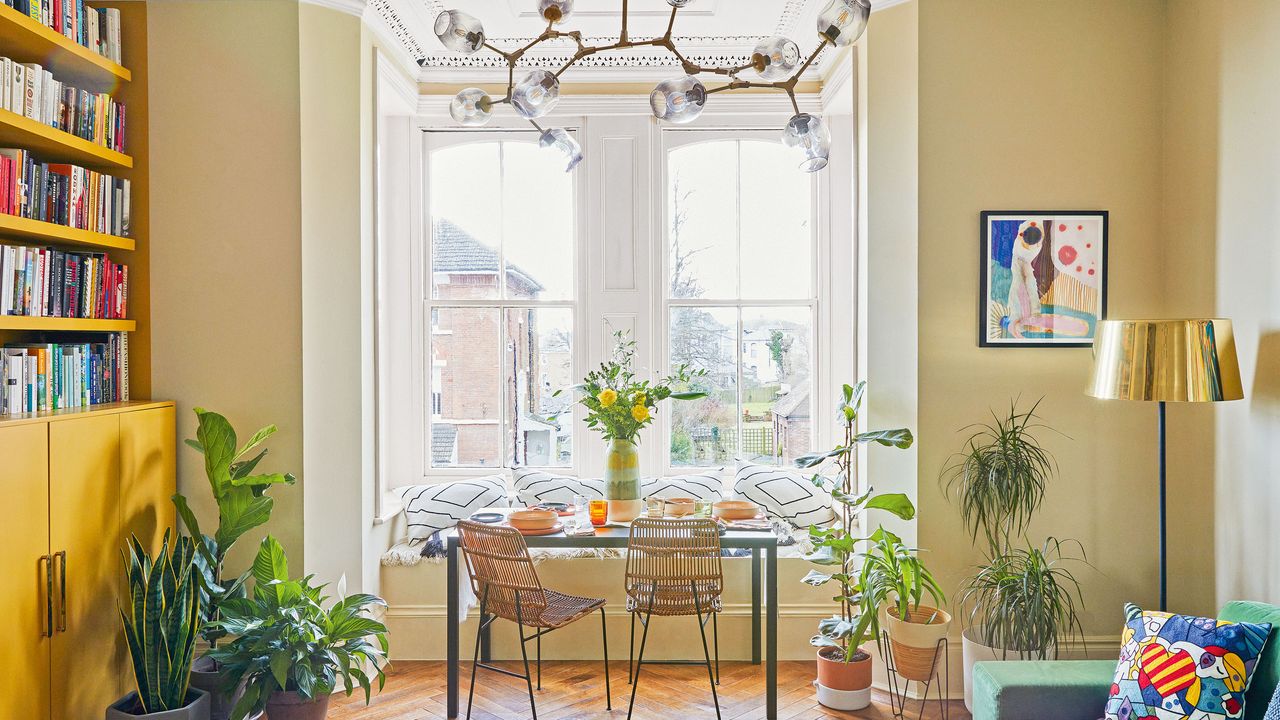 Dining area in a bay window of a period home