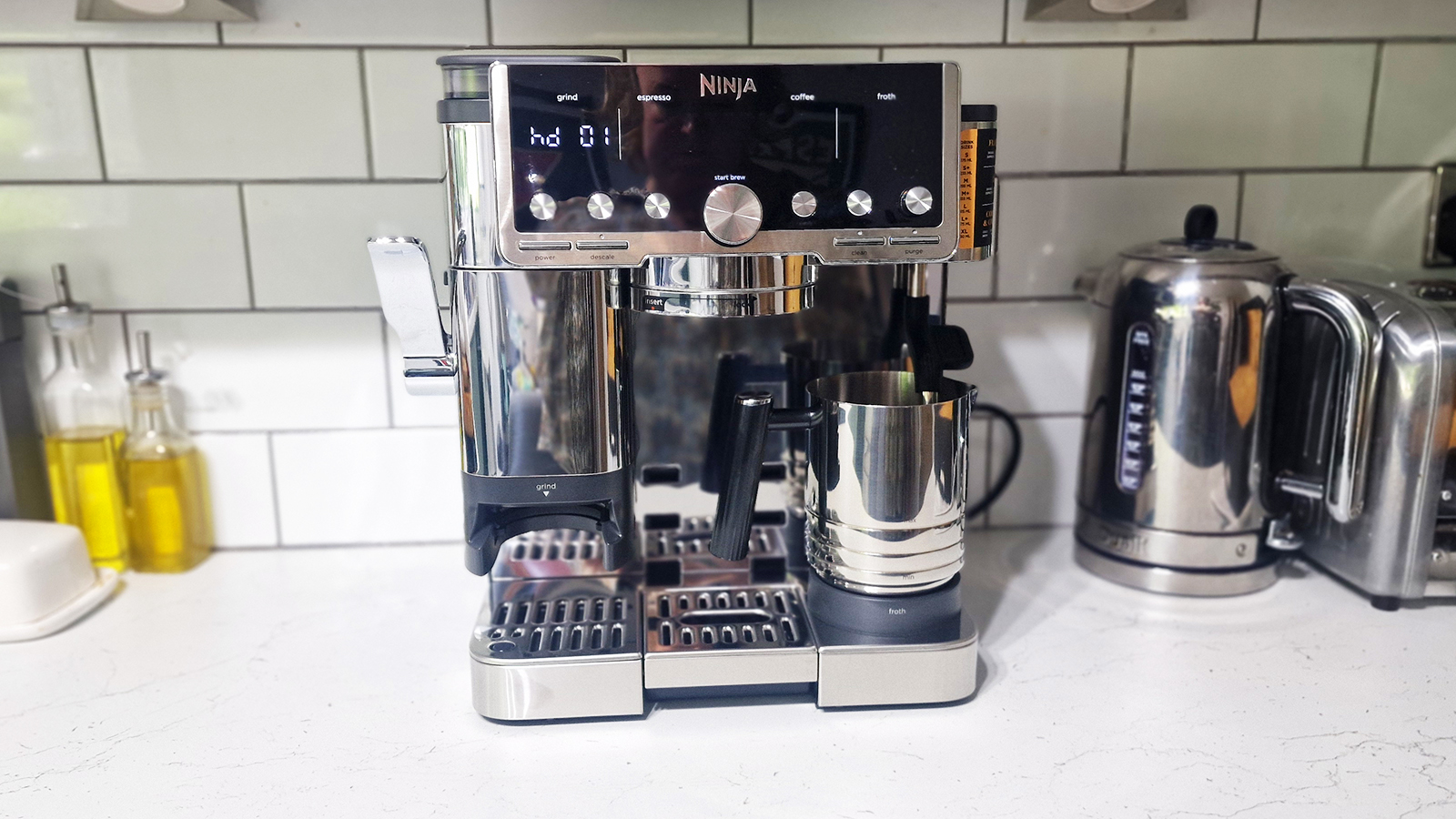 Ninja Luxe Café Pro being tested in a green and white kitchen
