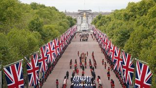 Queen Elizabeth's funeral cortege borne on the State Gun Carriage of the Royal Navy, travels along The Mall on September 19, 2022