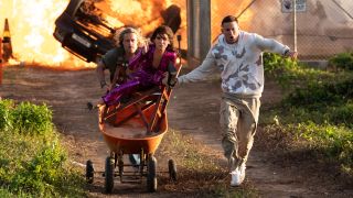 Brad Pitt, Sandra Bullock and Channing Tatum running away from an explosion in The Lost City trailer