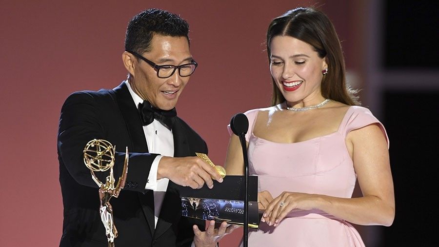 Daniel Dae Kim and Sophia Bush present an Emmy