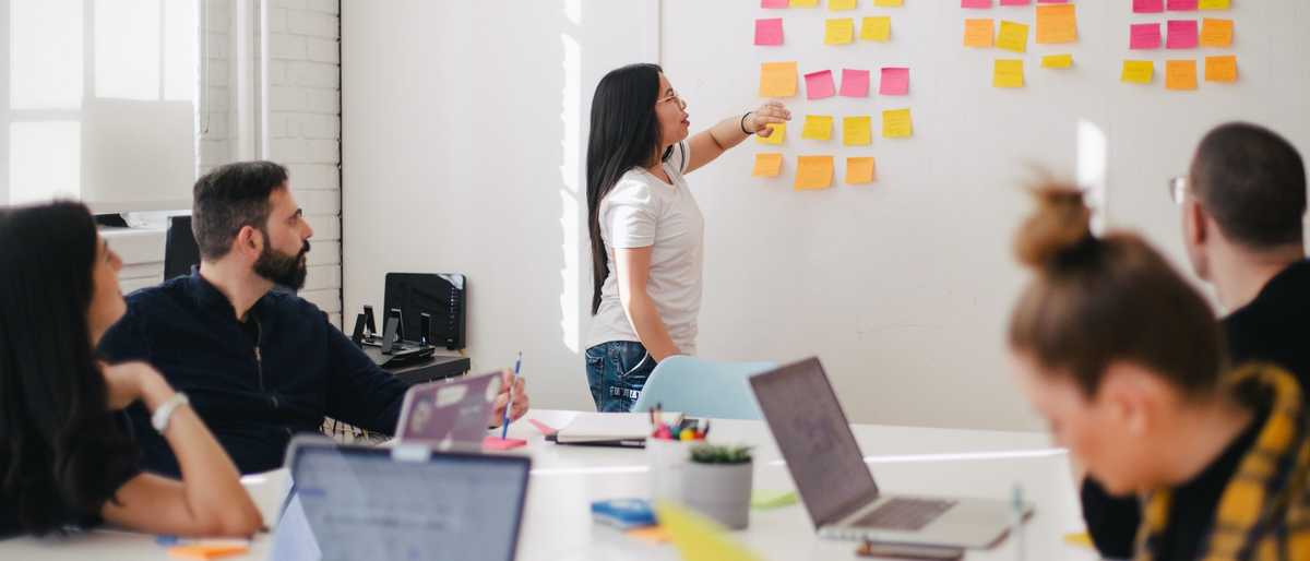 Group in office working with post-notes