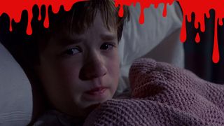  Haley Osment as a child in bed looking scared 