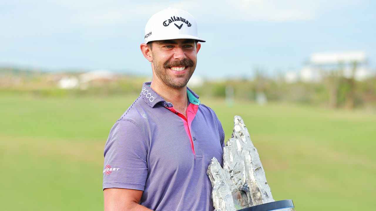 Erik van Rooyen with the World Wide Technology Championship trophy