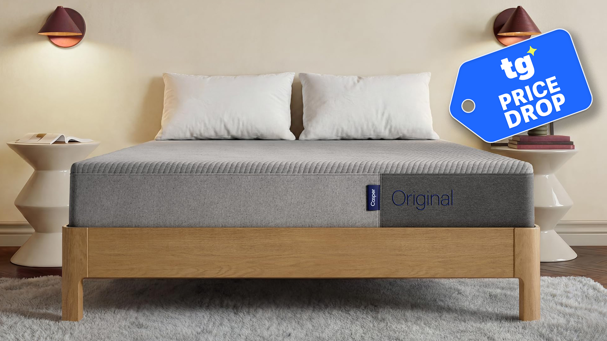The Casper Orignal memory foam mattress on a bed frame in room, a Tom's Guide Price Drop deals graphic in the top right corner
