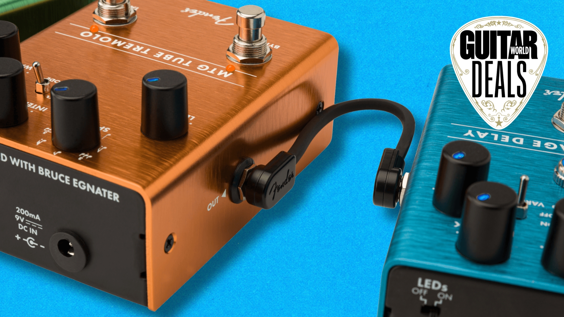 Close up of two pedal connected by a Fender patch cable