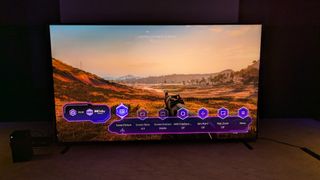 Hisense 110UXN with Battlefield V and Game Bar on screen