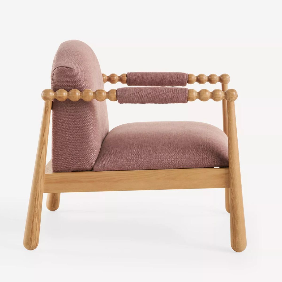 Purple chair with bobble arms