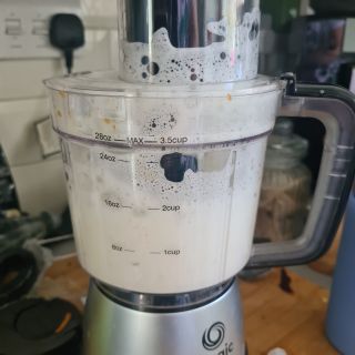 Magic Bullet food processor being cleaned