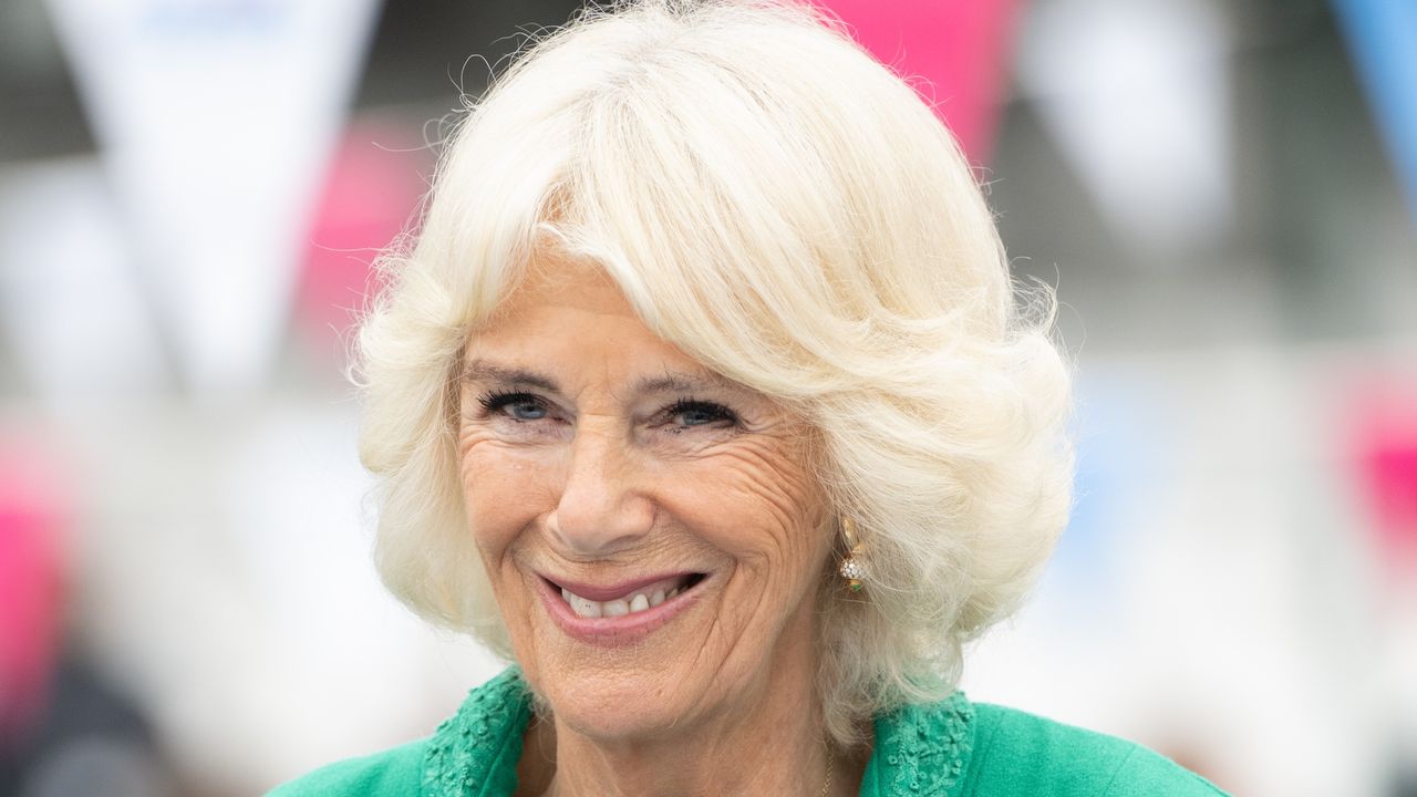 Queen Camilla&#039;s engagement ring details explained. Seen here the Queen is at the Big Jubilee Lunch At The Oval