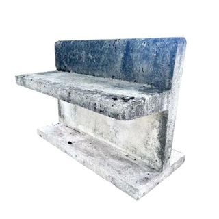 modernist concrete bench on a white background