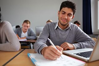 student taking test in class