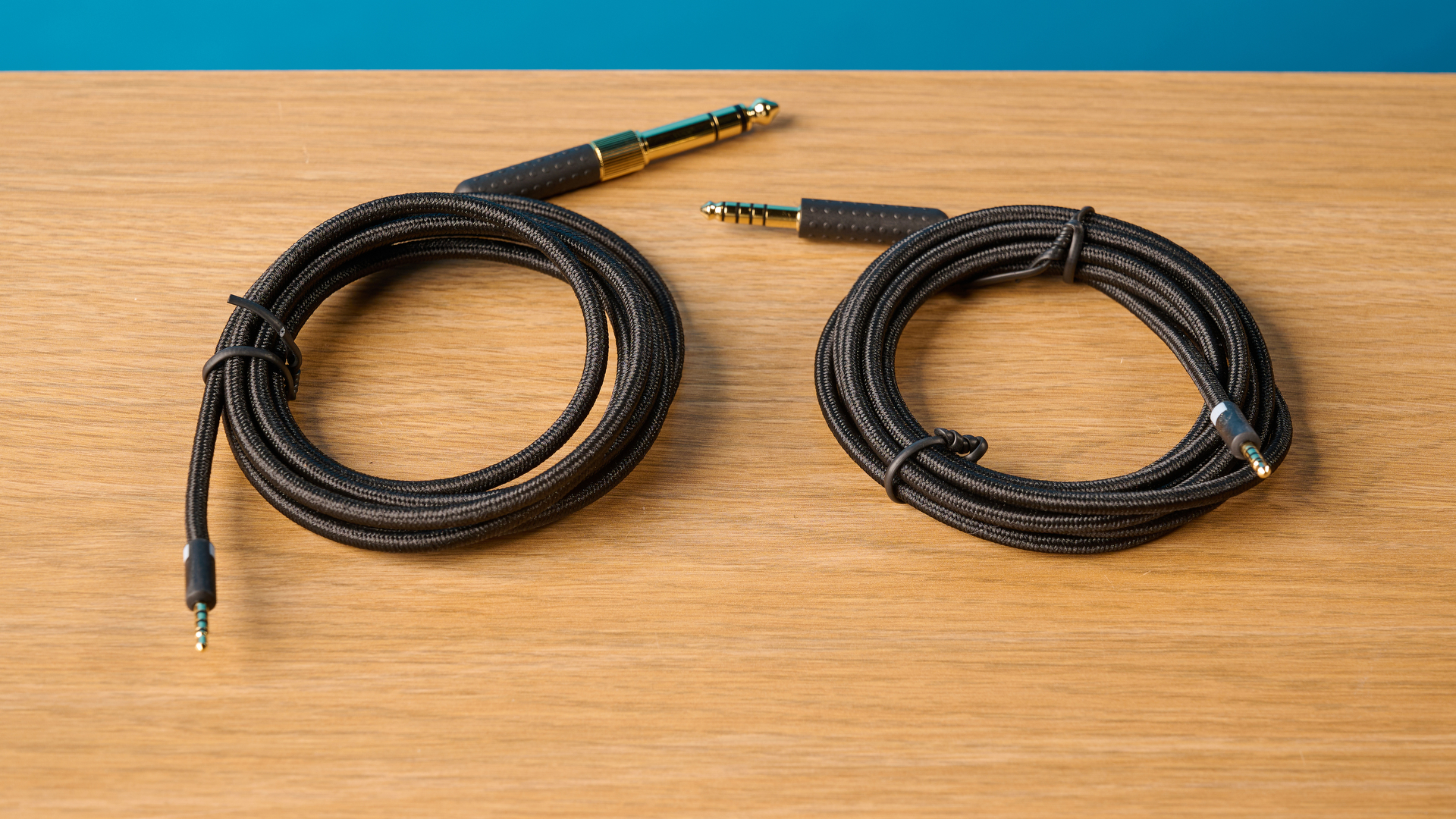 Grell OAE2 studio headphones photographed in front of a blue background
