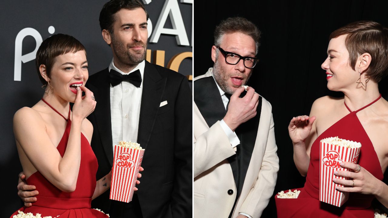 Emma Stone wears a bright red Louis Vuitton gown and fills her pockets with popcorn at SNL 50th Anniversary