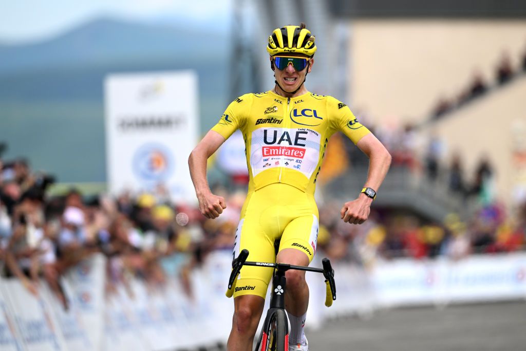 SAINTLARYSOULAN PLA DADET FRANCE JULY 13 Tadej Pogacar of Slovenia and UAE Team Emirates Yellow Leader Jersey celebrates at finish line as stage winner during the 111th Tour de France 2024 Stage 14 a 1519km stage from Pau to SaintLarySoulan Pla dAdet 1653m UCIWT on July 13 2024 in SaintLarySoulan Pla dAdet France Photo by Tim de WaeleGetty Images