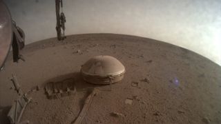 This photo may be the final Mars picture beamed home by NASA's InSight lander on the Red Planet as its power supply dwindles. It was released on Dec. 19, 2022.