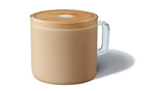 A glass mug of Starbucks Flat White Coffee