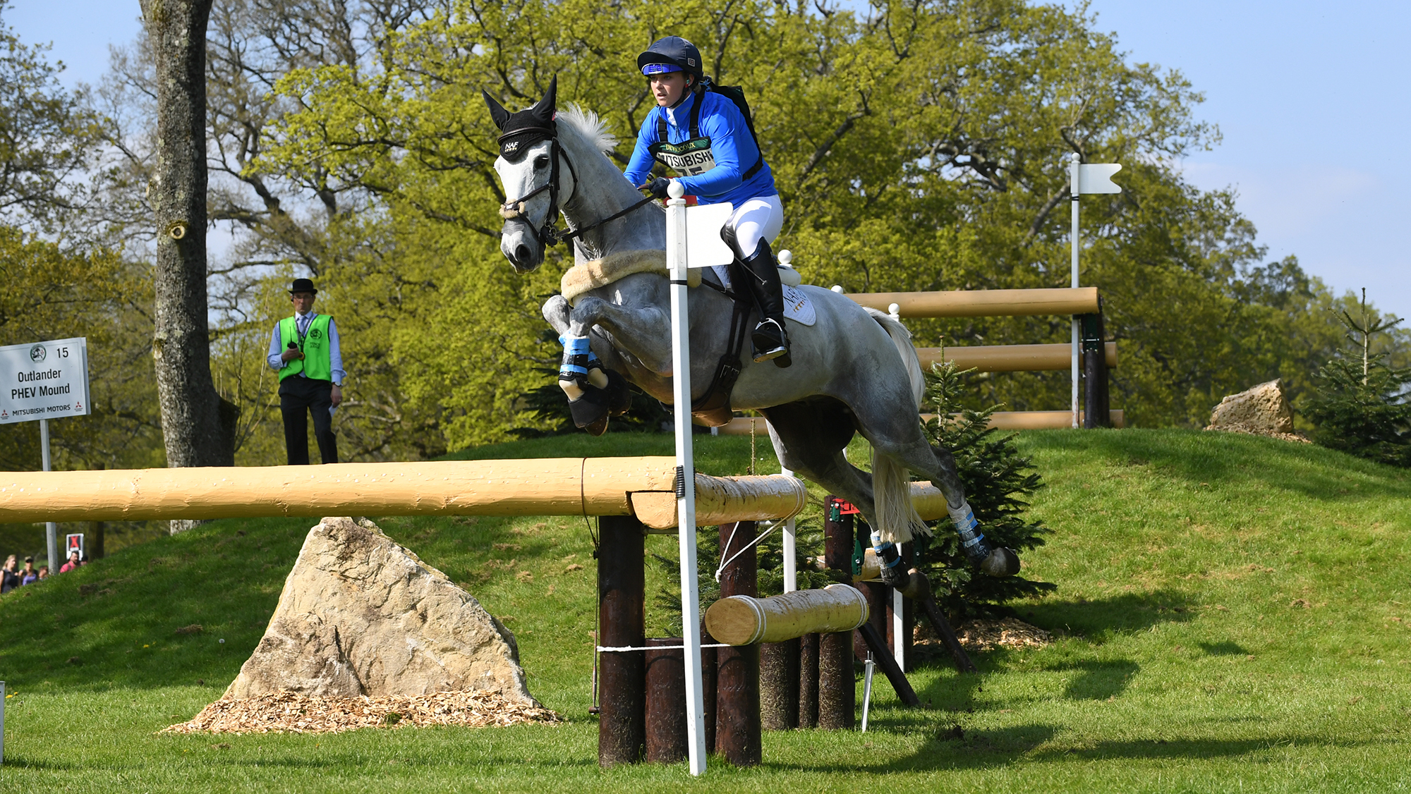 Dani Stewart-Richardson (n&amp;eacute;e Evans) and Smart Time jump a cross-country fence at Badminton 2018.