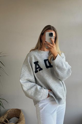 Mollie Campsie wearing the ada knit sweatshirt