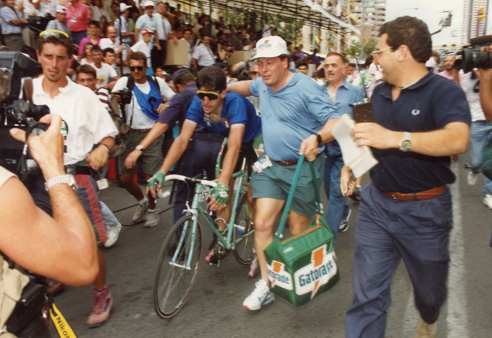The scrum just after Bugno crosses the finish line