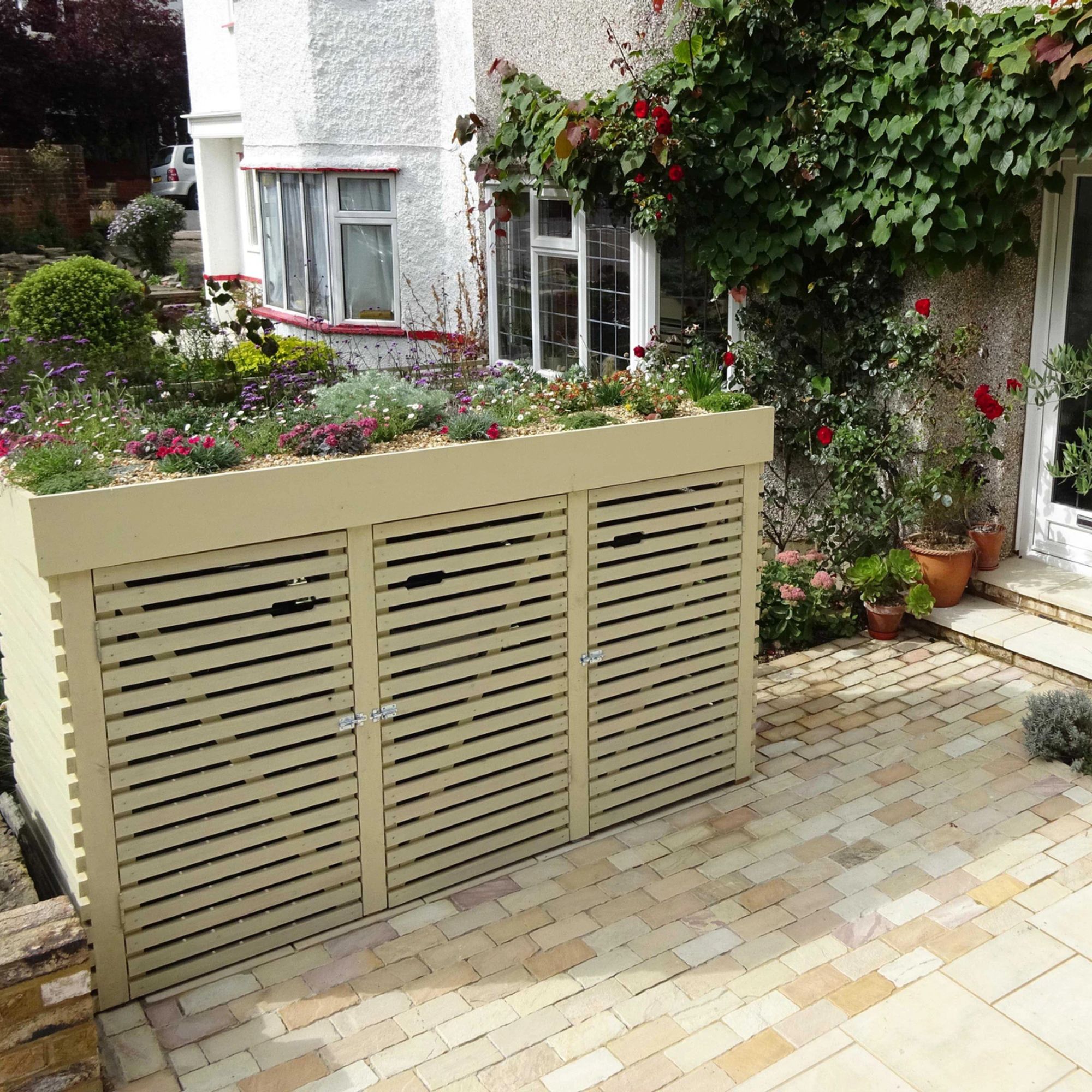 garden bin store with green roof Fenton Roberts Garden Design