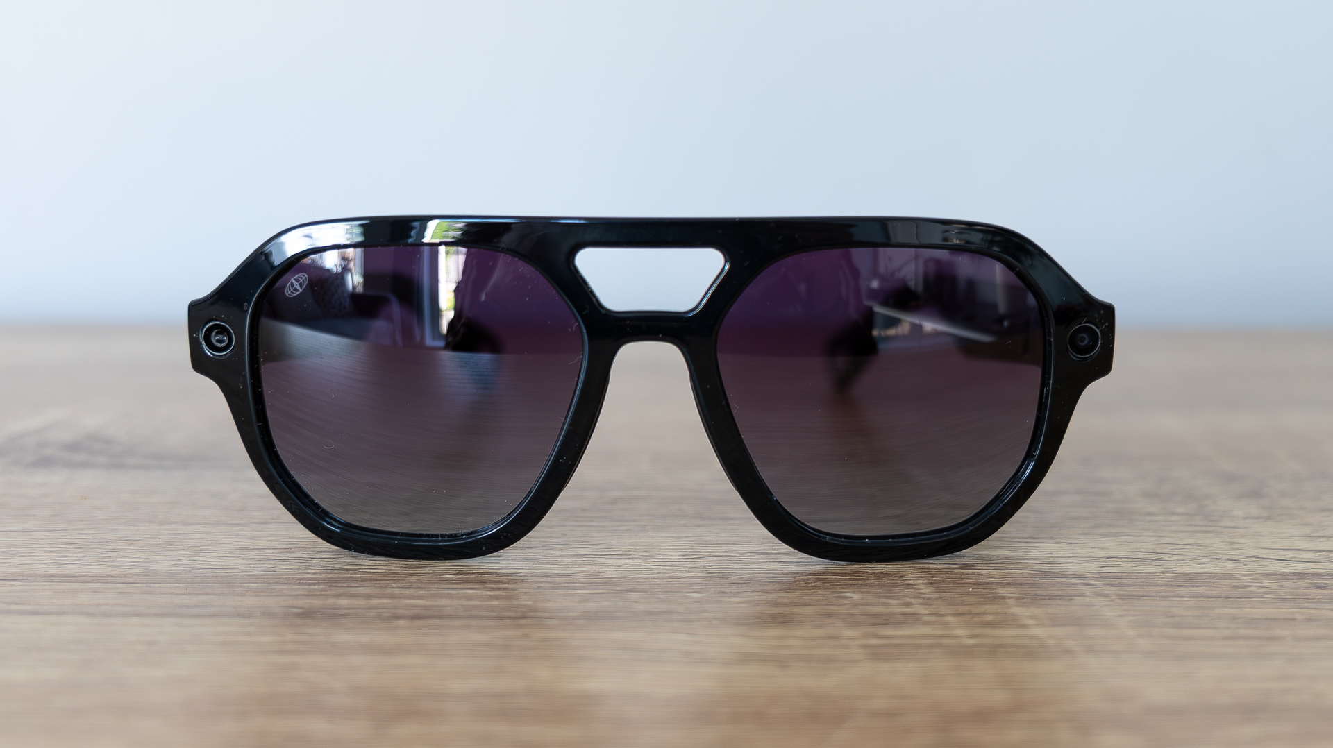 L'Atitude 52&amp;deg;N Smart Glasses review images, in case, on a sideboard and worn outside