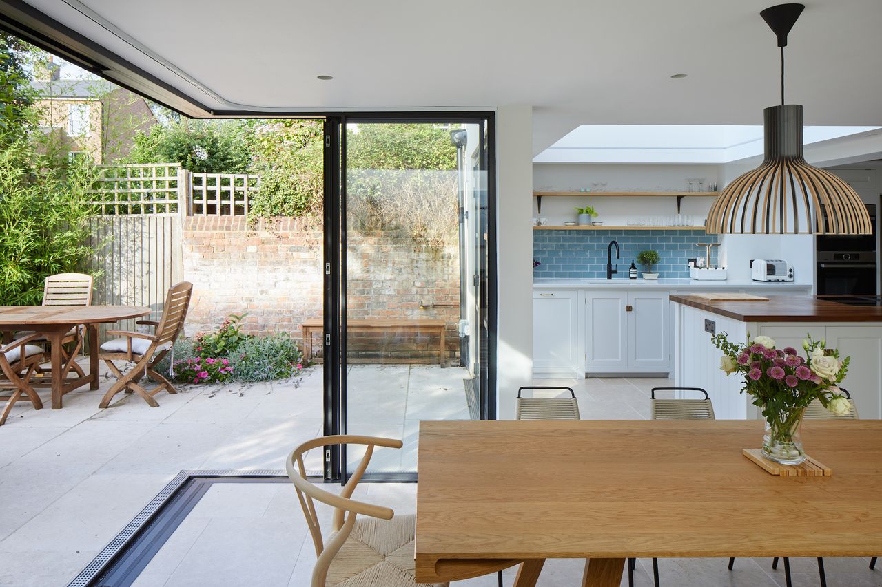 modern dining room extension with sliding glass doors
