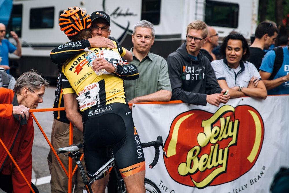 Tom Zirbel (Optum Pro Cycling) hugs his uncle before the race. Tom is a native of Clear Lake, IA and many of his relatives came to Minnesota to watch him race