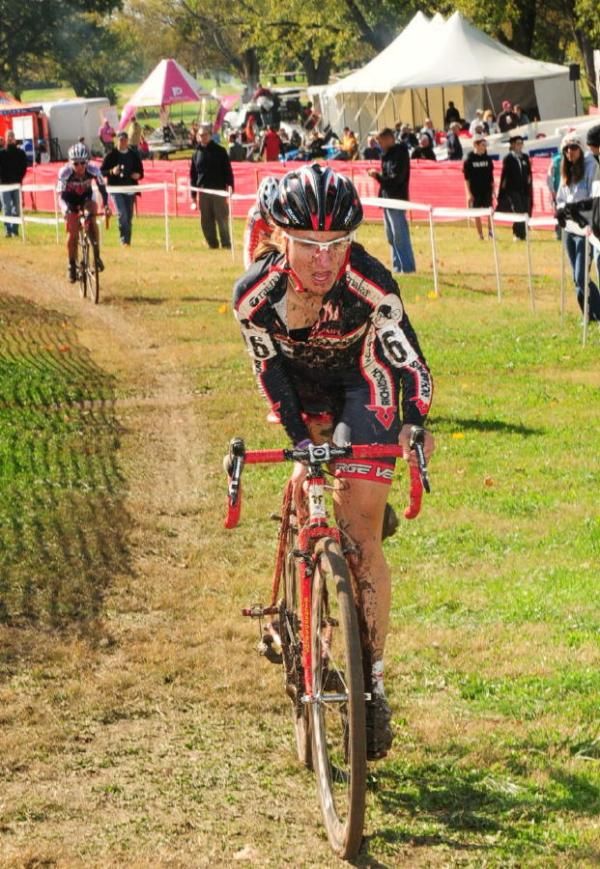 Amy Dombroski (Richard Sachs-RGM Watches) dismounting for the Green Monster