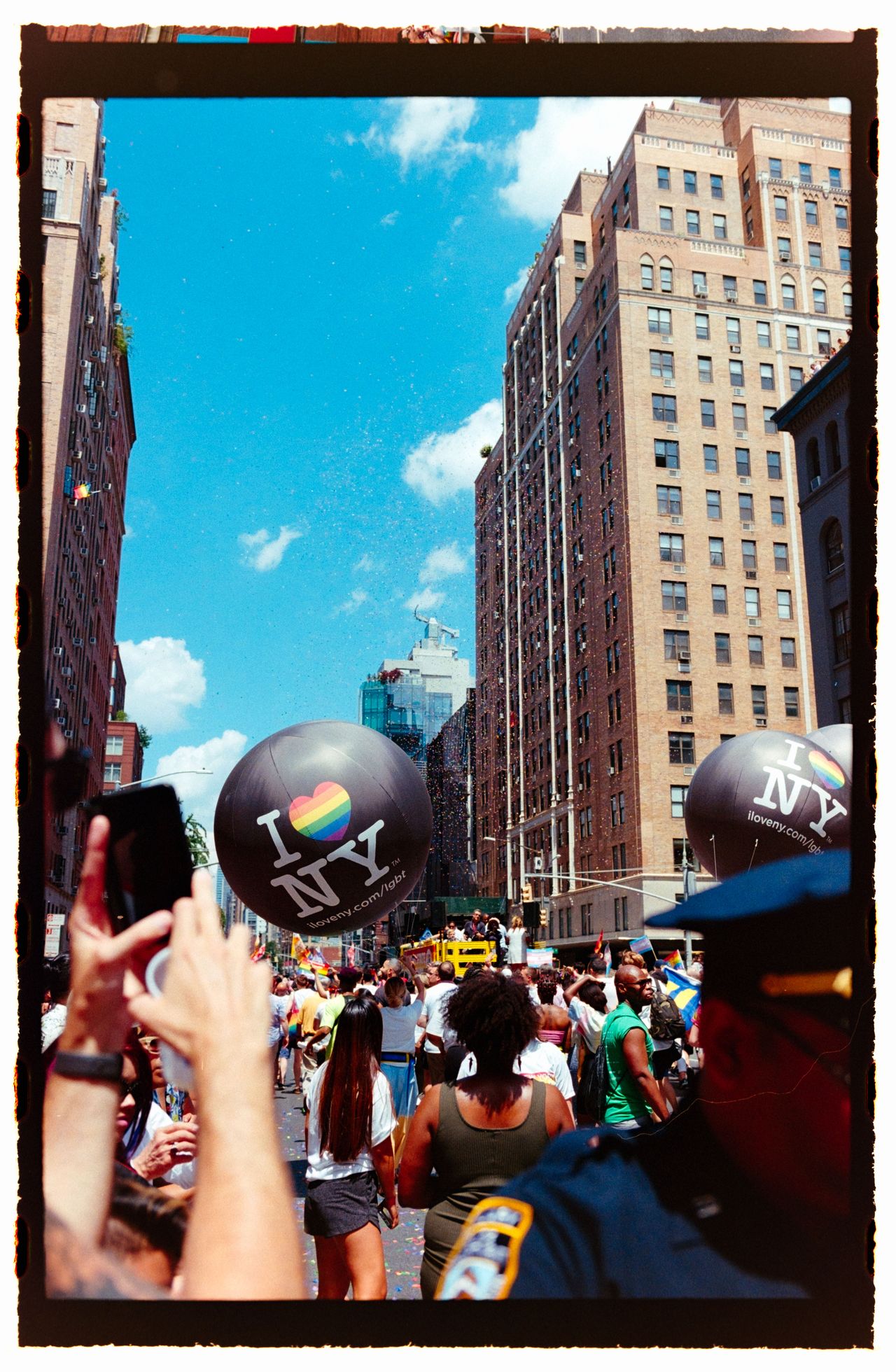 New York Pride parade, shot on 35mm film with film borders around the outside of the image