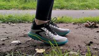 Woman's feet wearing Hoka Zinal 2 running shoes