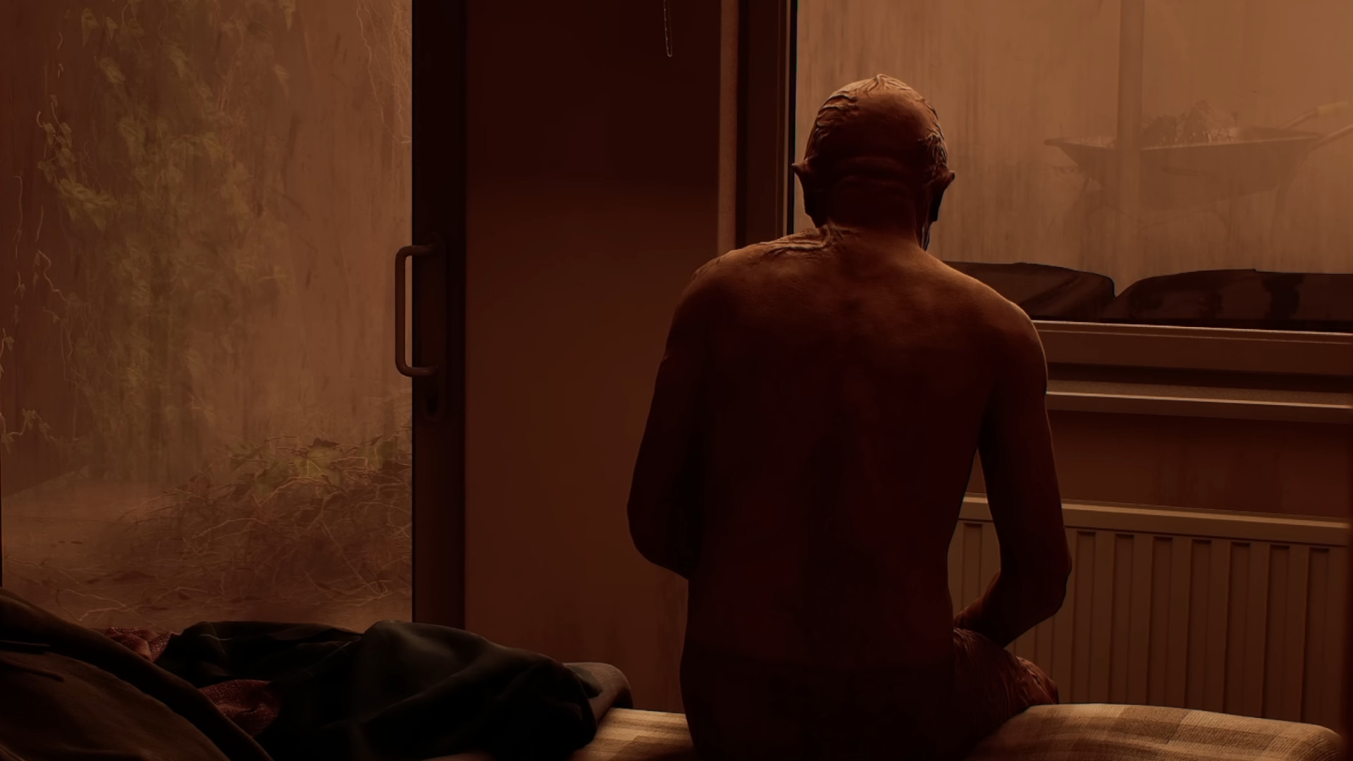 A monster sitting on a bed during the trailer for the upcoming game, Silent Hill: Townfall