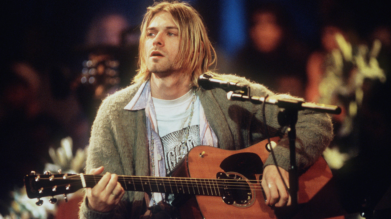 Cobain with the Martin D-18E guitar