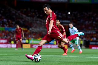 Santi Cazorla in action for Spain in a friendly against Bolivia in 2014.