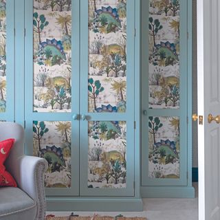Blue wardrobe with wallpaper interiors