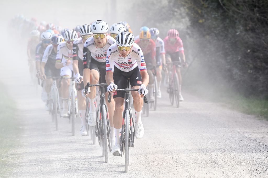 The pack of riders pictured in action during the men elite 'Strade Bianche' one day cycling race, 213km from and to Siena, Italy on Saturday 08 March 2025. BELGA PHOTO DIRK WAEM (Photo by DIRK WAEM / BELGA MAG / Belga via AFP)